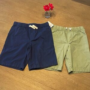 Set of two boys Carter’s shorts - new. Size 7, colors navy and green.